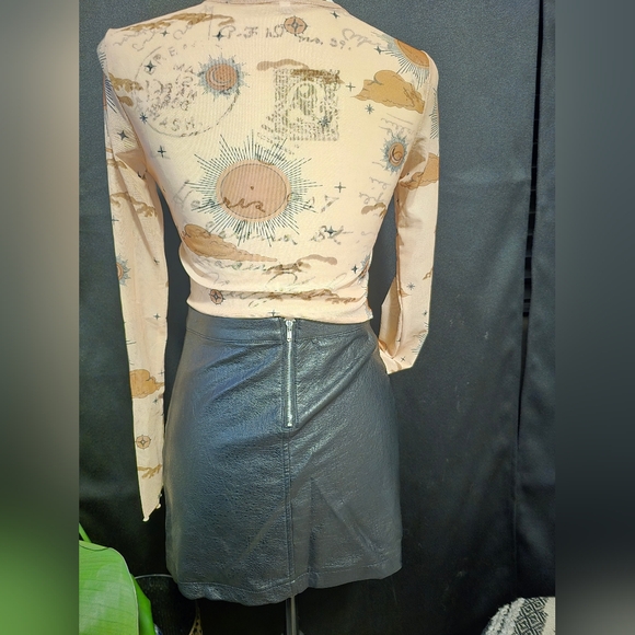 Sheer nudes color, crew neck crop top with ruffled edges on sleeves and torso. - Picture 2 of 7